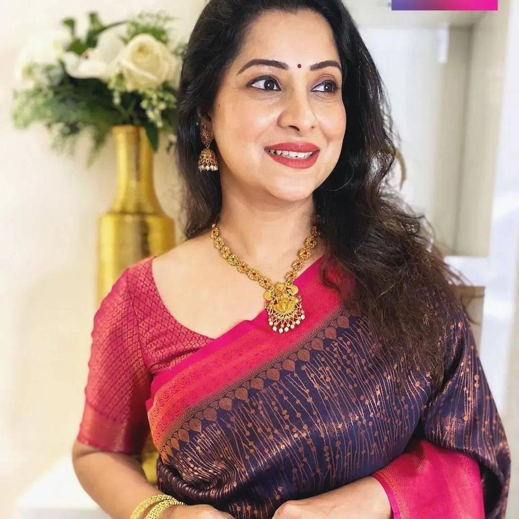 Banarasi Silk saree collection featuring intricate gold zari weaving and heavy border detailing; available exclusively in two signature colors: deep maroon and festive gold.