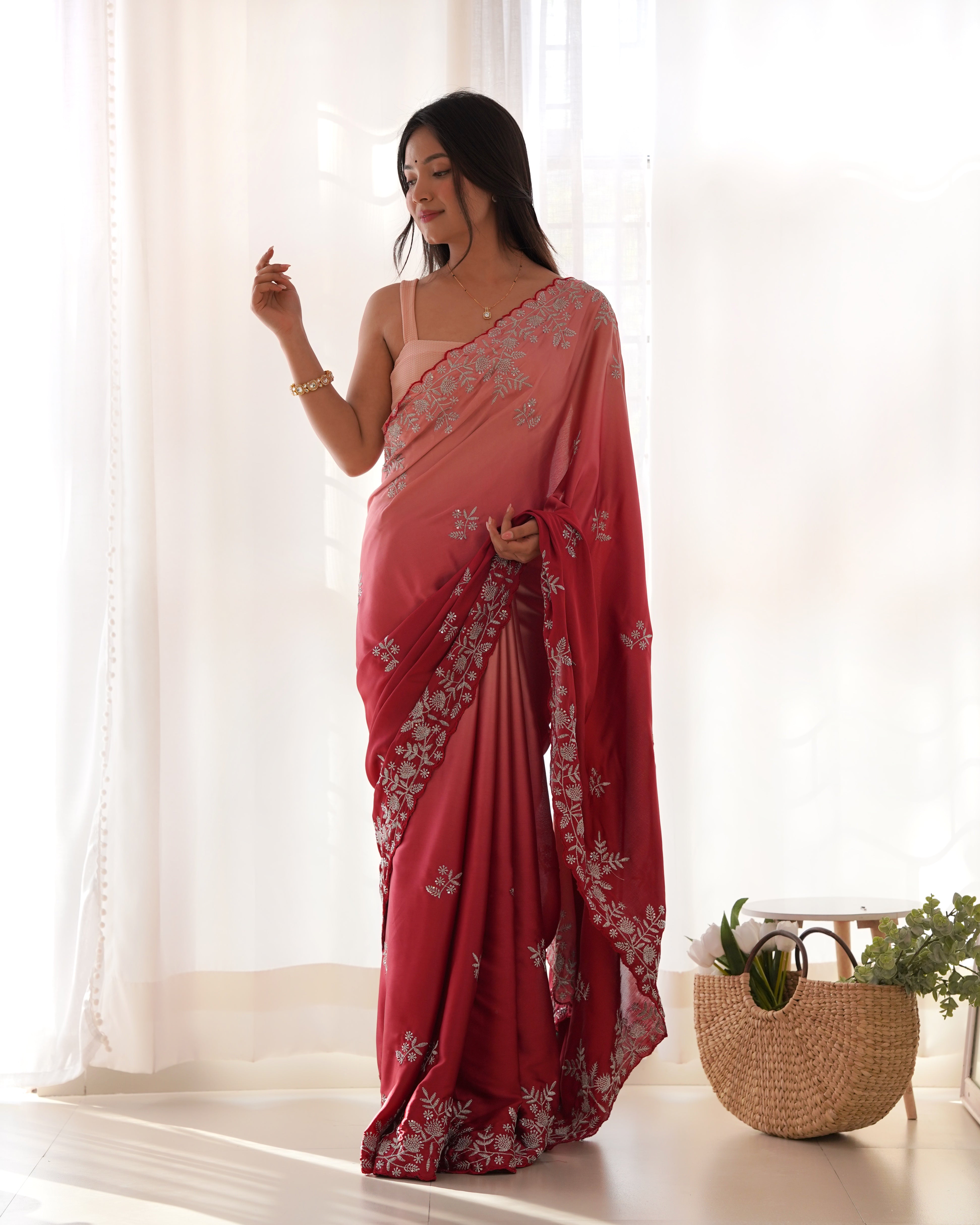 Grey and black ombre heavy Japan satin saree with intricate zari dori and sequence embroidery worn by a model