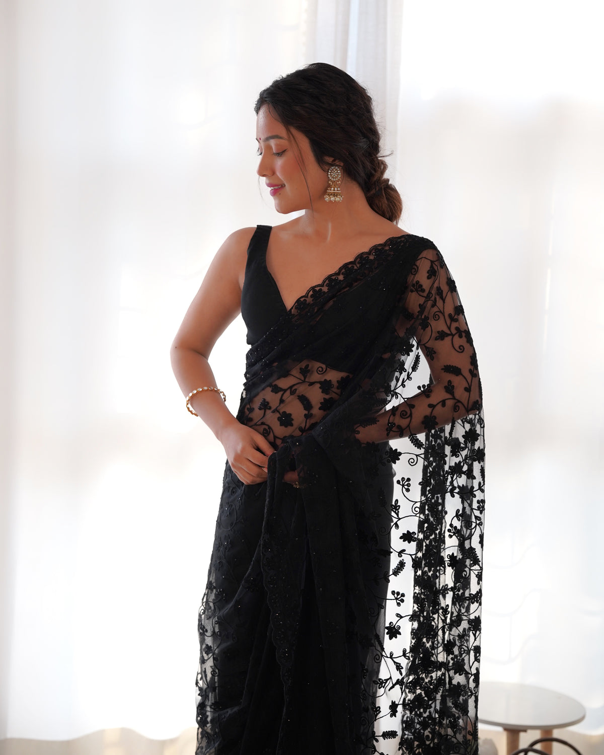 heavy butterfly net saree with tone on tone aari embroidery stone work rich pallu