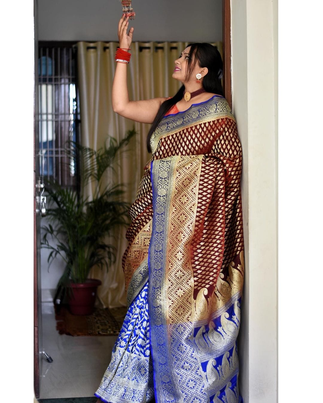Traditional Banarasi silk saree with intricate gold motifs