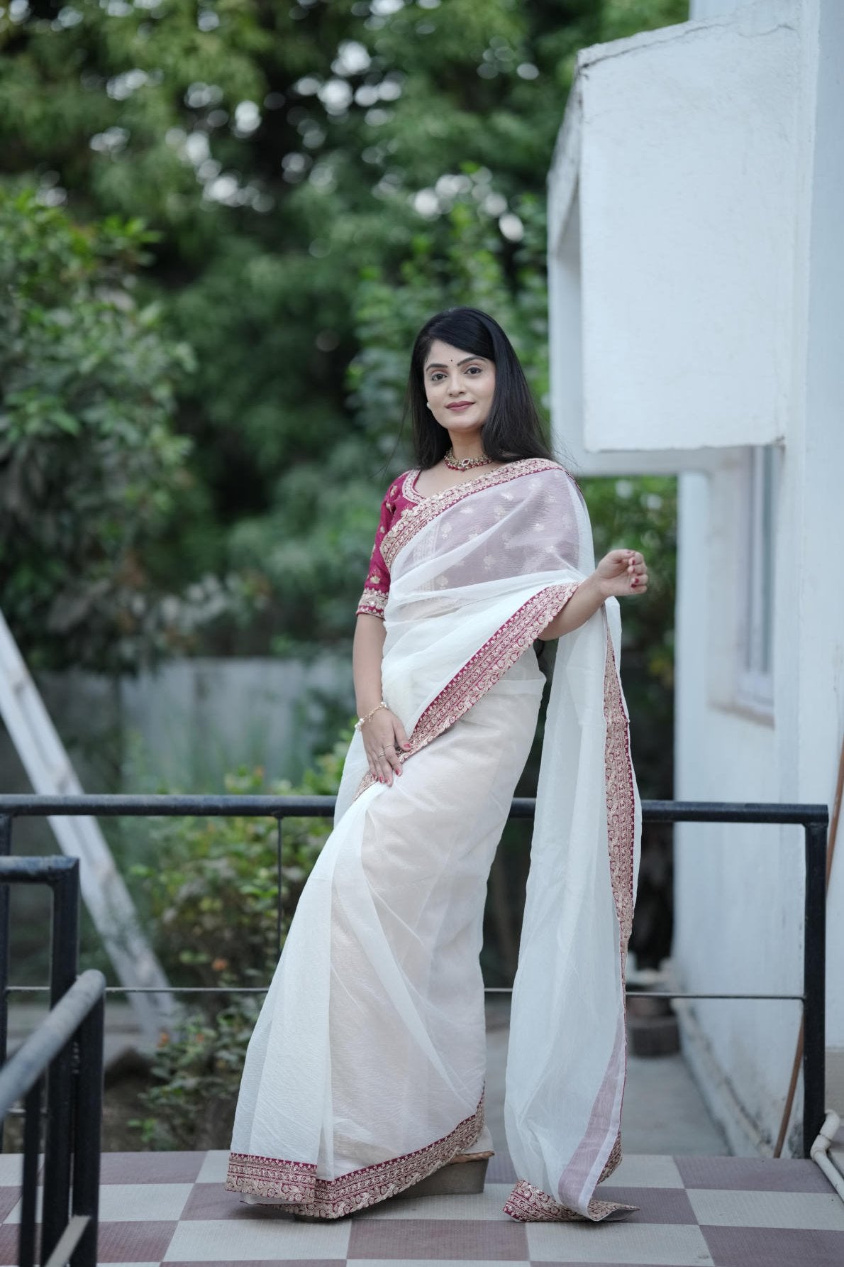 off white banarasi crush saree with sequins border and maroon embroidered blouse