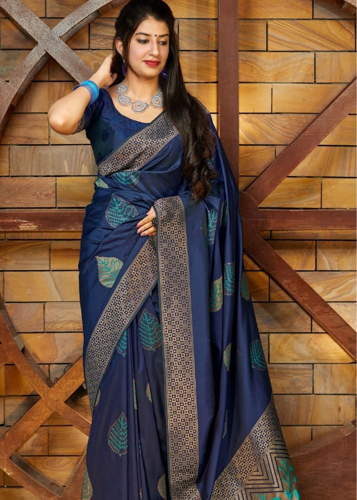 Soft Lichi Silk saree collection with rich traditional zari weaving and soft sheen; available in four versatile colors, offering an elegant drape and comfortable wear.
