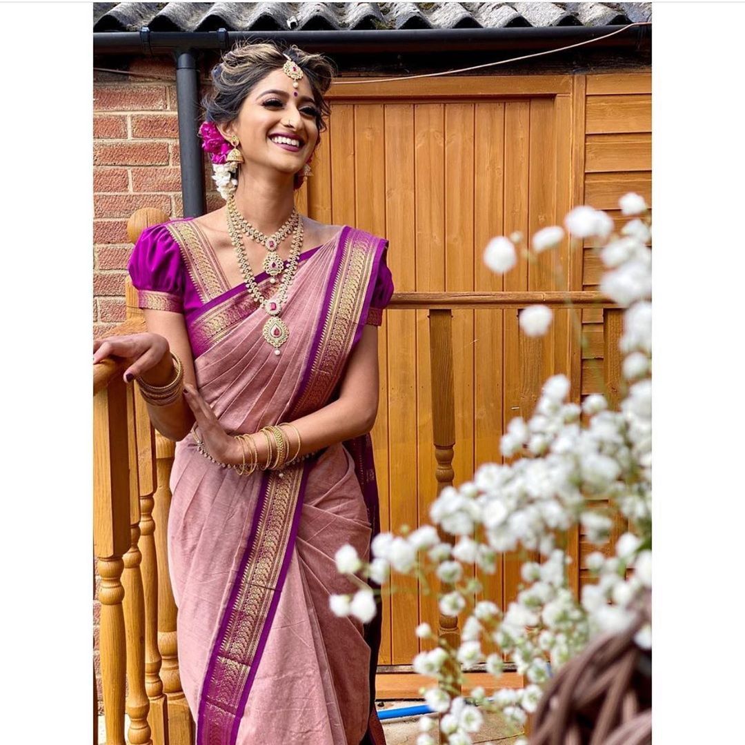 Banarasi Silk Saree collection featuring intricate zari weaving and a heavy traditional border; available in a complete range of six luxurious colors, 