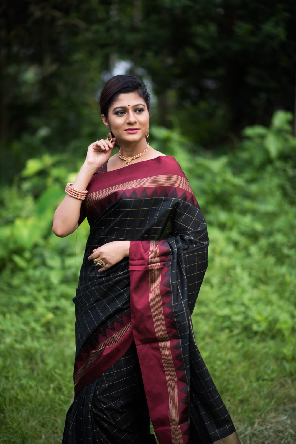Celestial Banarasi Soft Silk saree collection with a fluid drape and fine zari weaving; available in seven majestic colors, offering a spectrum of luxurious hues for grand occasions.