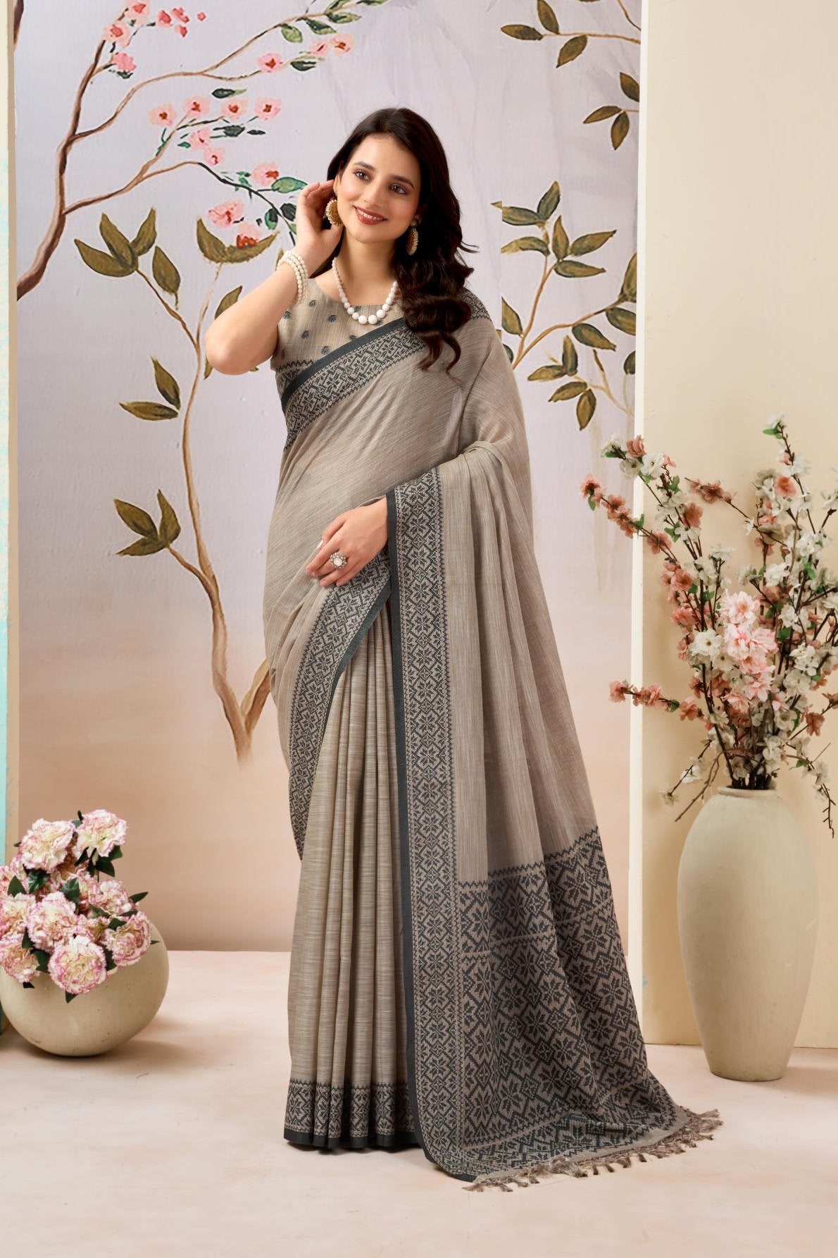 A high-quality Pure Linen by Linen Handloom Saree (6.30 meters) showcasing a traditional woven border and pallu. It includes a running Pure Linen blouse piece (0.80 meters) detailed with all-over weave buttis and a complementary border, offered as a six-piece set.