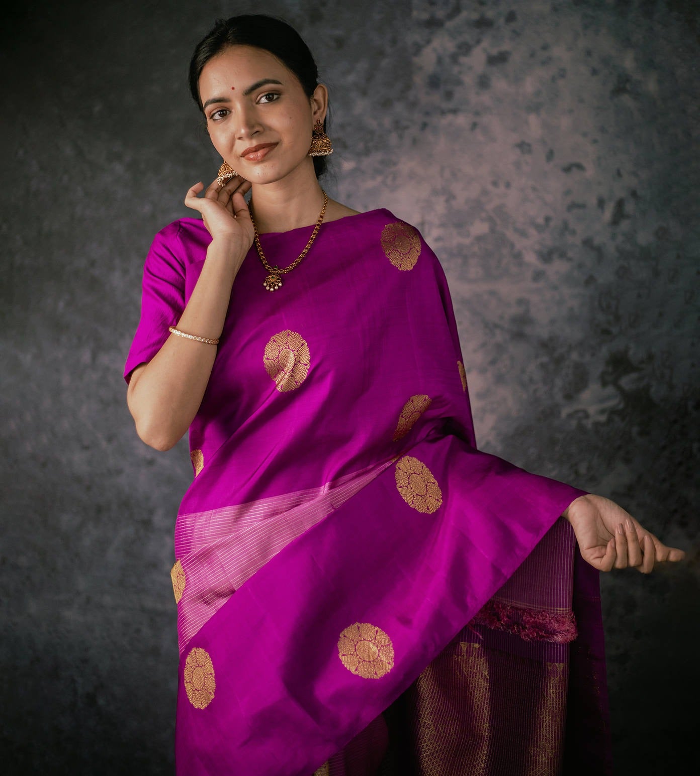 Handwoven with rich silk threads and gold zari detailing