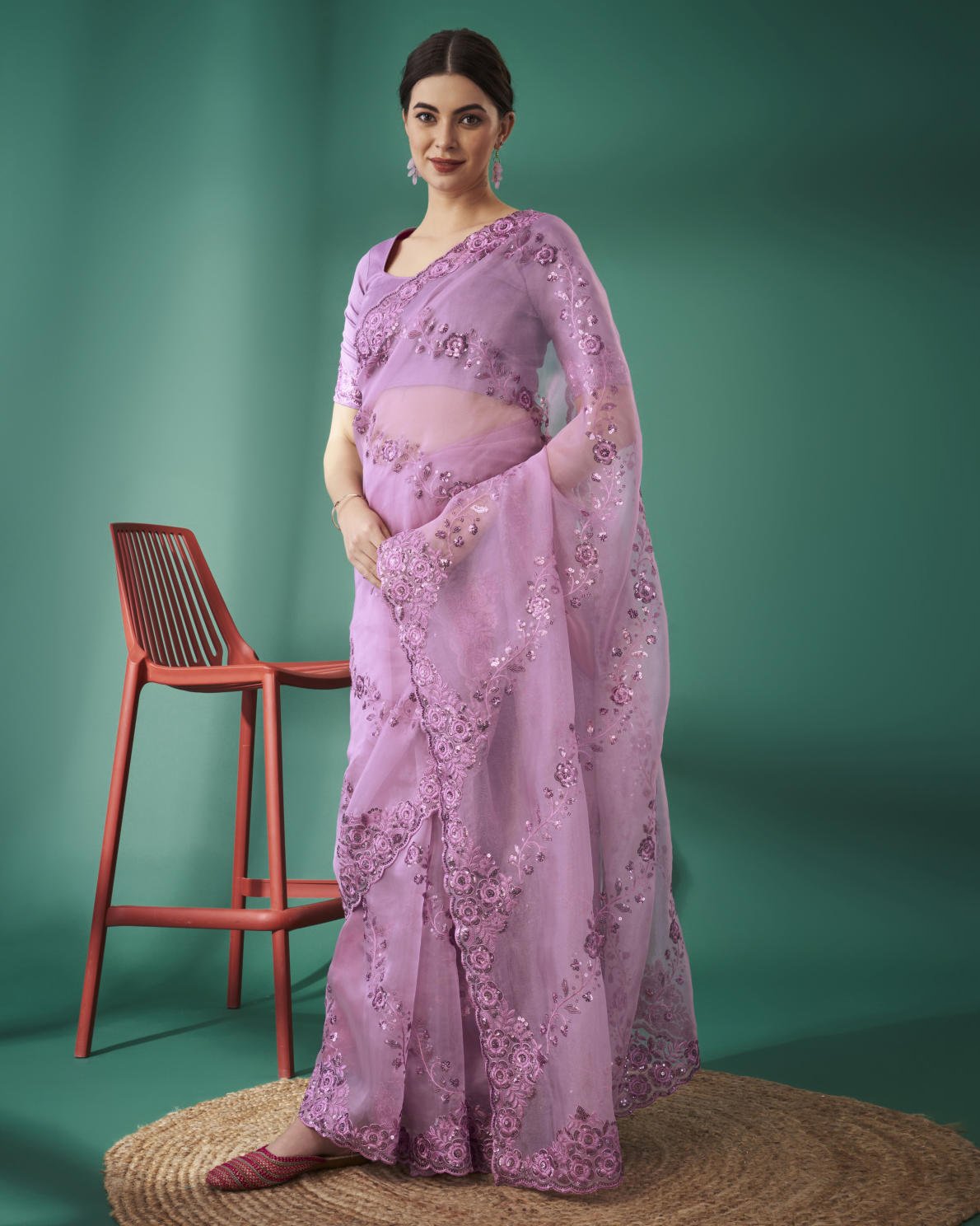 Lilac Organza Silk Saree with 5mm Sequence Embroidery and Cutwork Border worn by model