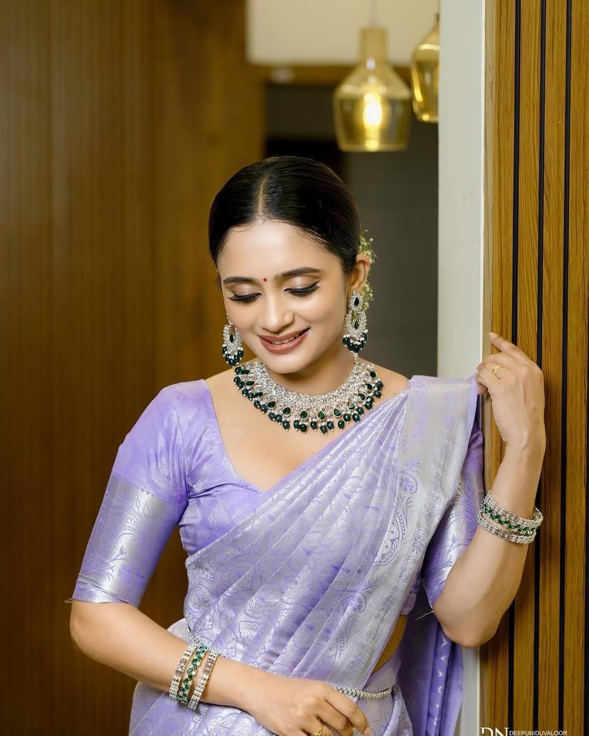 Traditional Banarasi saree with modern simplicity