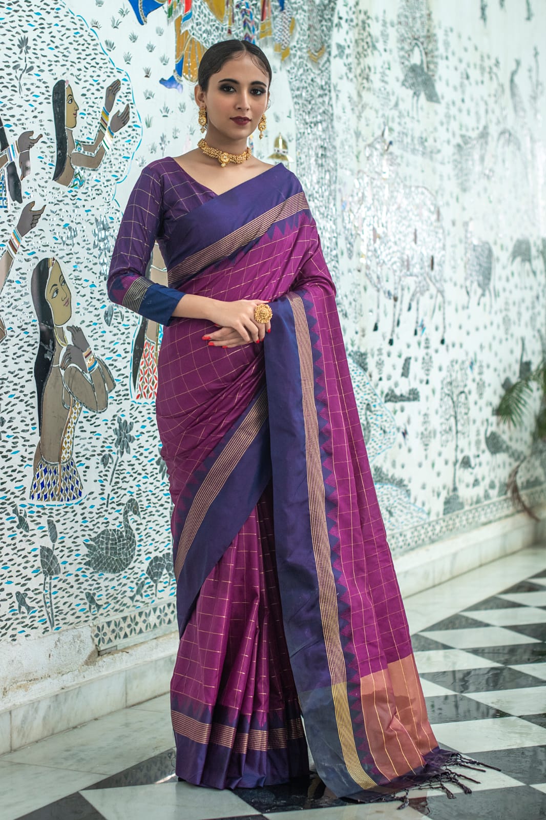 Celestial Banarasi Soft Silk saree collection with a fluid drape and fine zari weaving; available in seven majestic colors, offering a spectrum of luxurious hues for grand occasions.