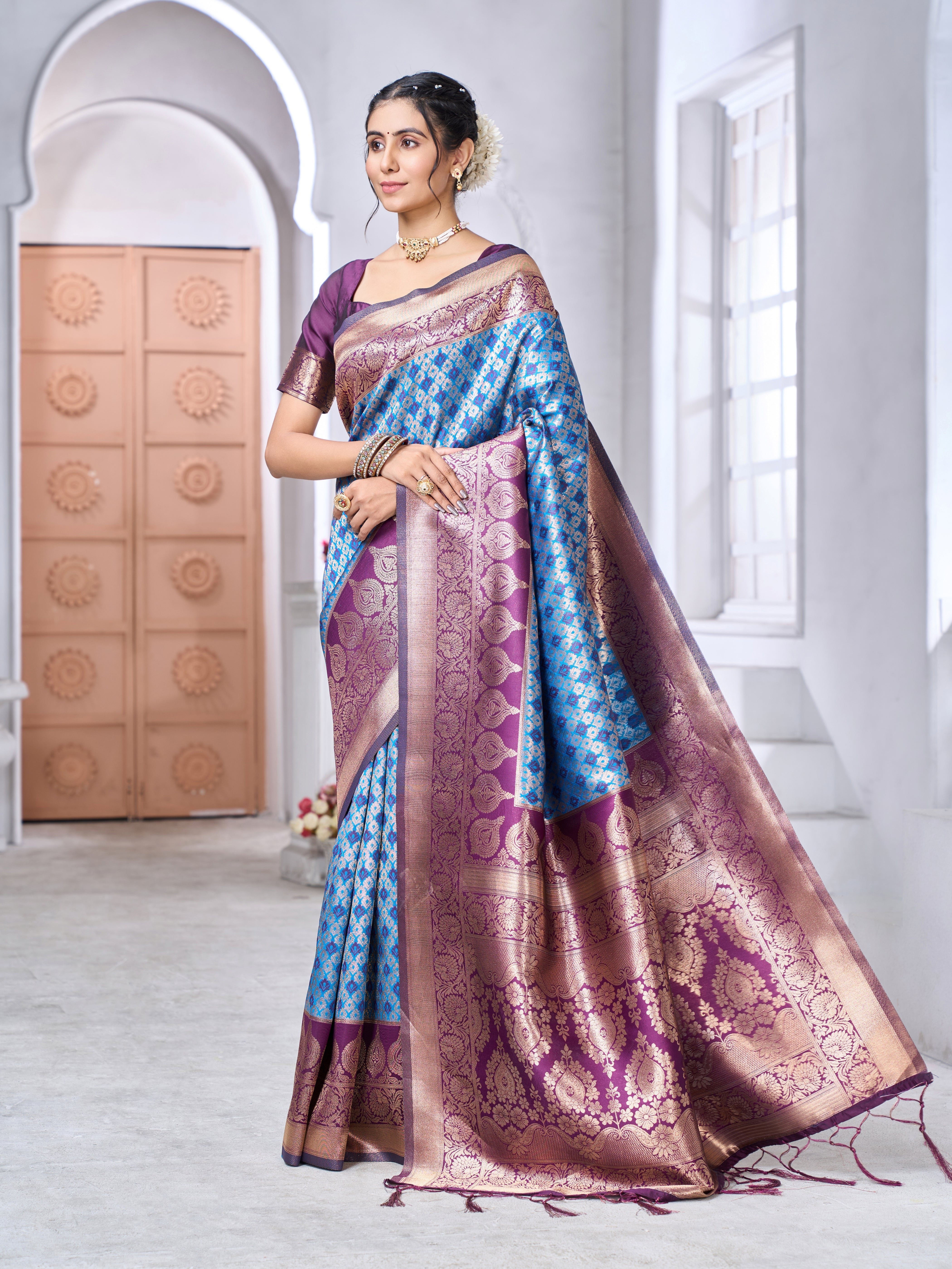 Banarasi soft silk saree in subtle tone with gold zari weaving worn by model outdoors