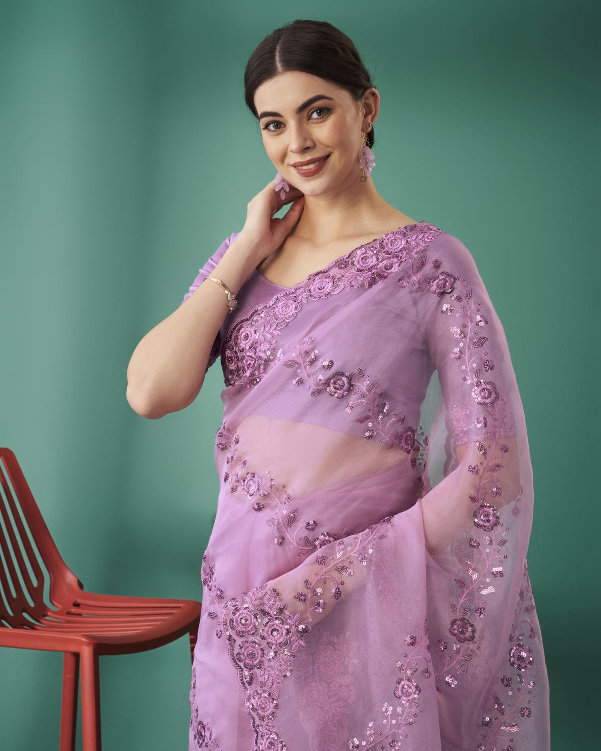 Lilac Organza Silk Saree with 5mm Sequence Embroidery and Cutwork Border worn by model