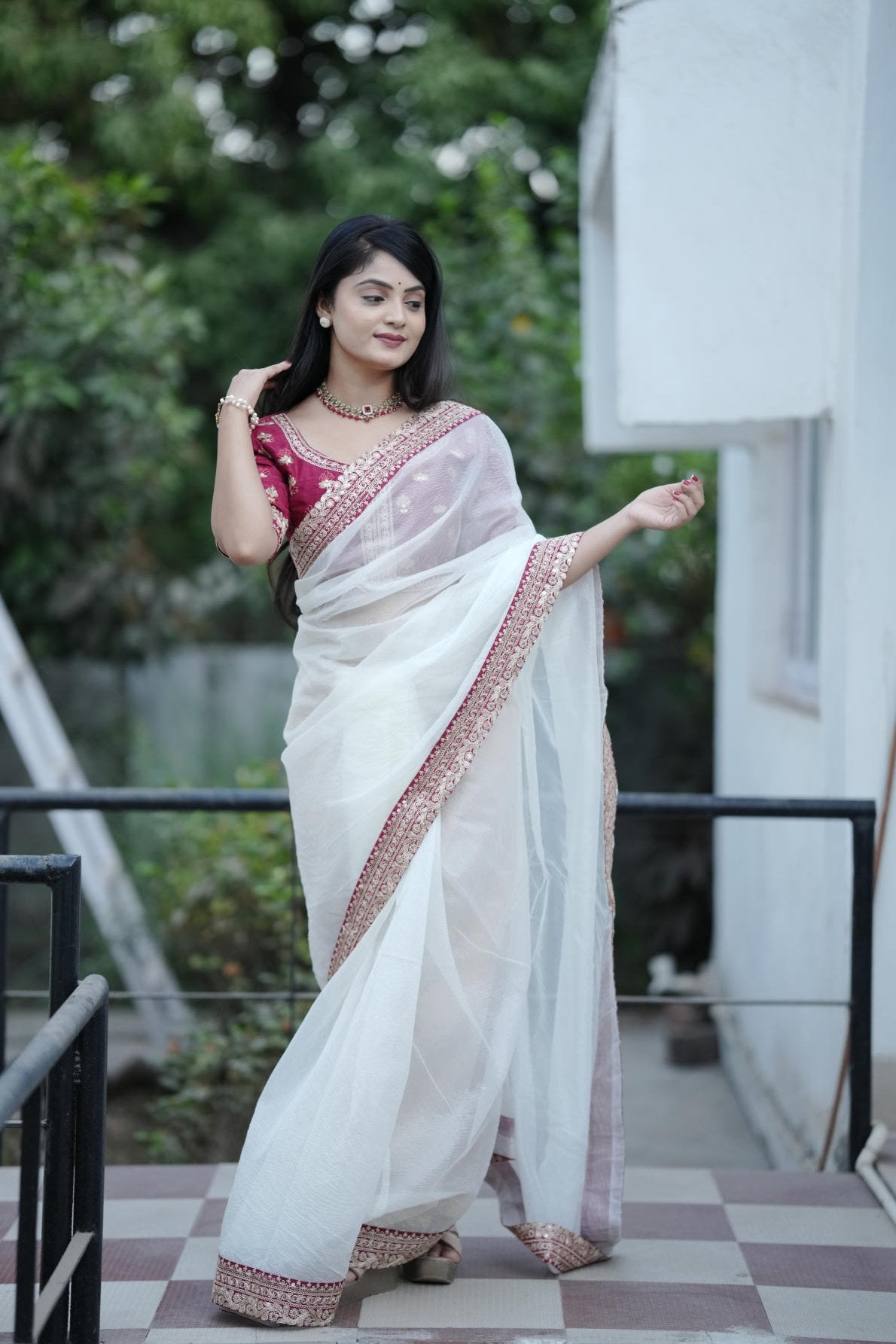 off white banarasi crush saree with sequins border and maroon embroidered blouse