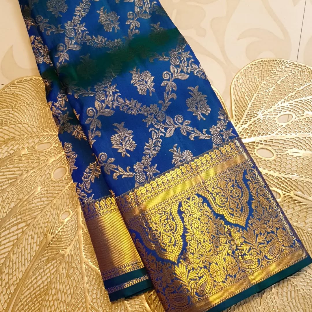 The First Aura Pratham Aabha Banarasi Soft Silk Saree The Original Shade Adorned with Gold Zari Grandeur