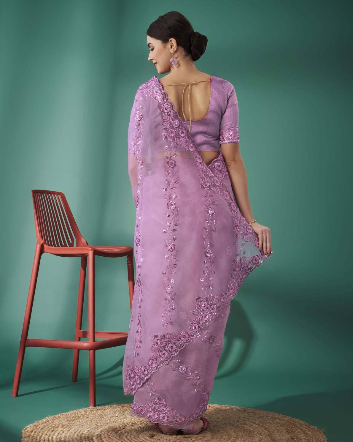 Lilac Organza Silk Saree with 5mm Sequence Embroidery and Cutwork Border worn by model