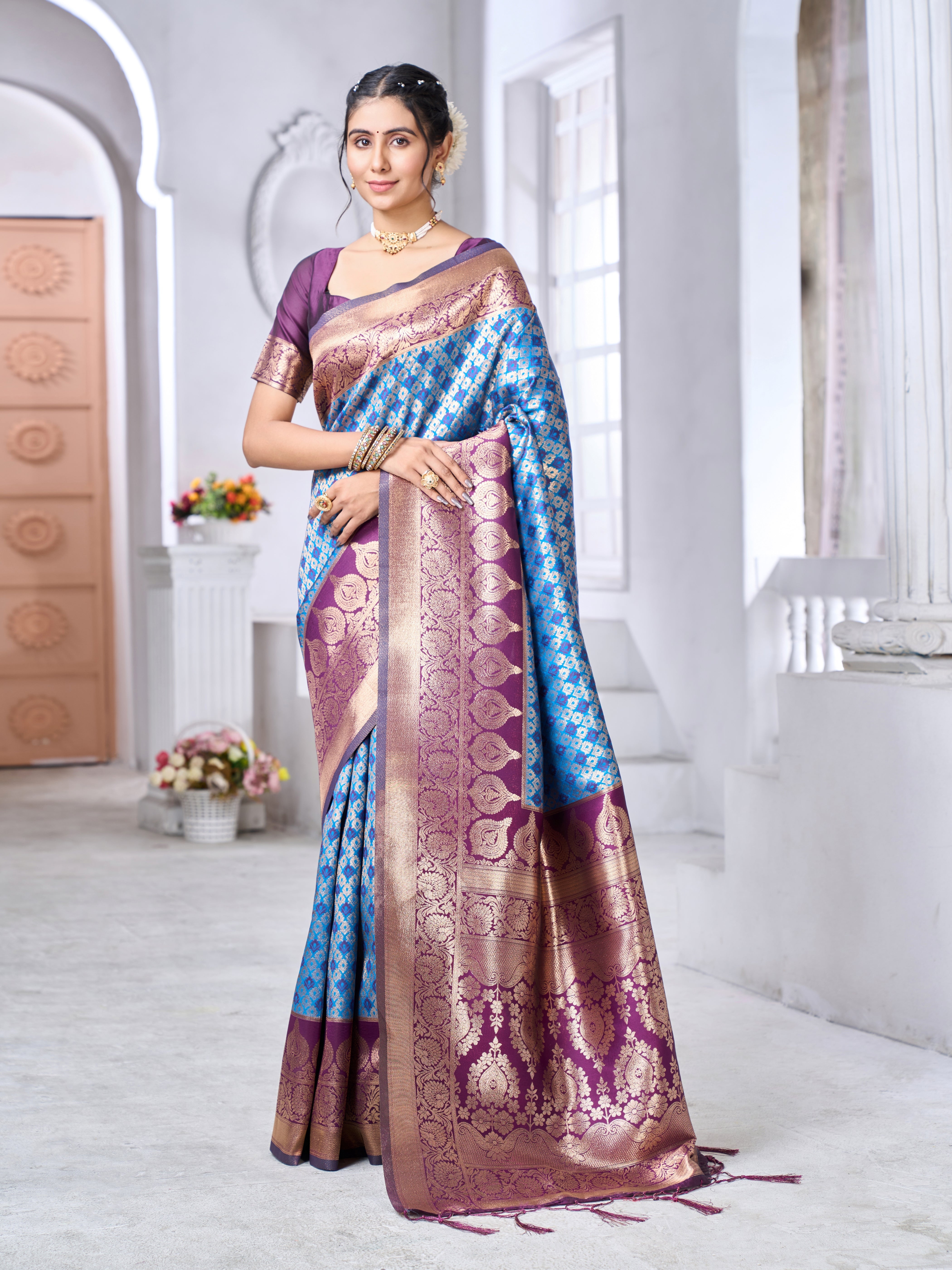 Banarasi soft silk saree in subtle tone with gold zari weaving worn by model outdoors