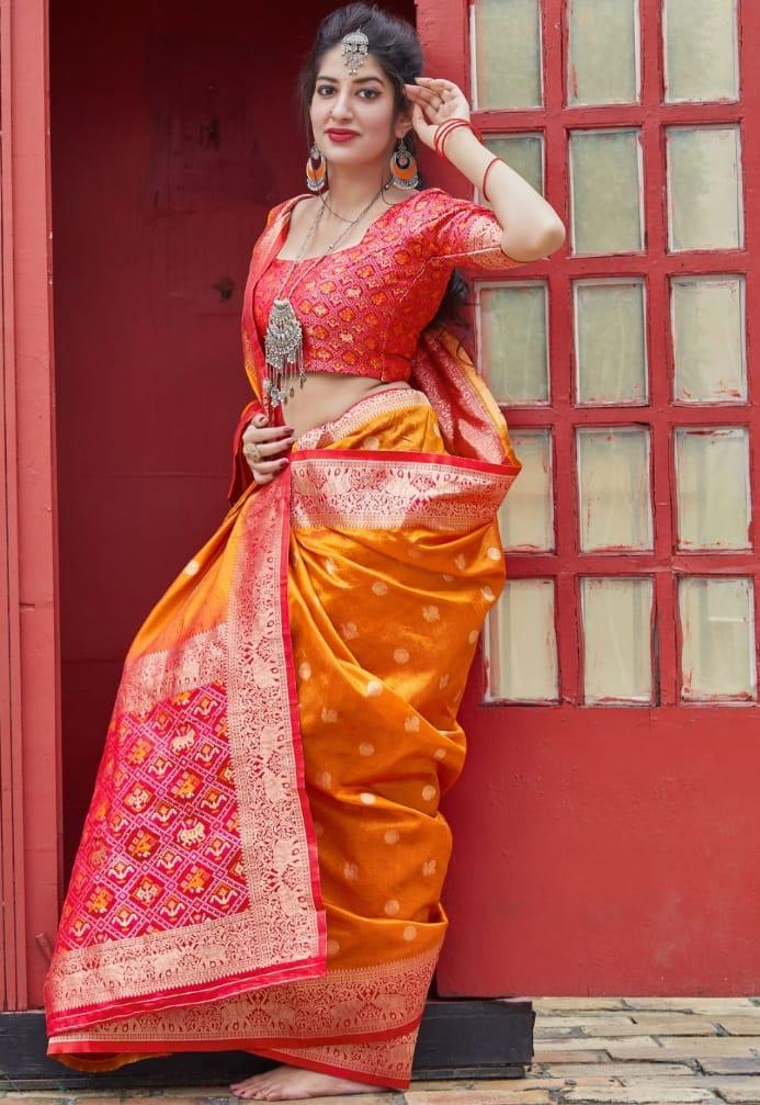 Luminous Soft Lichi Silk saree in vibrant deep magenta, featuring a subtle self-weave texture and a wide, opulent border intricately woven with lustrous gold zari, elegantly photographed as a flat product shot.