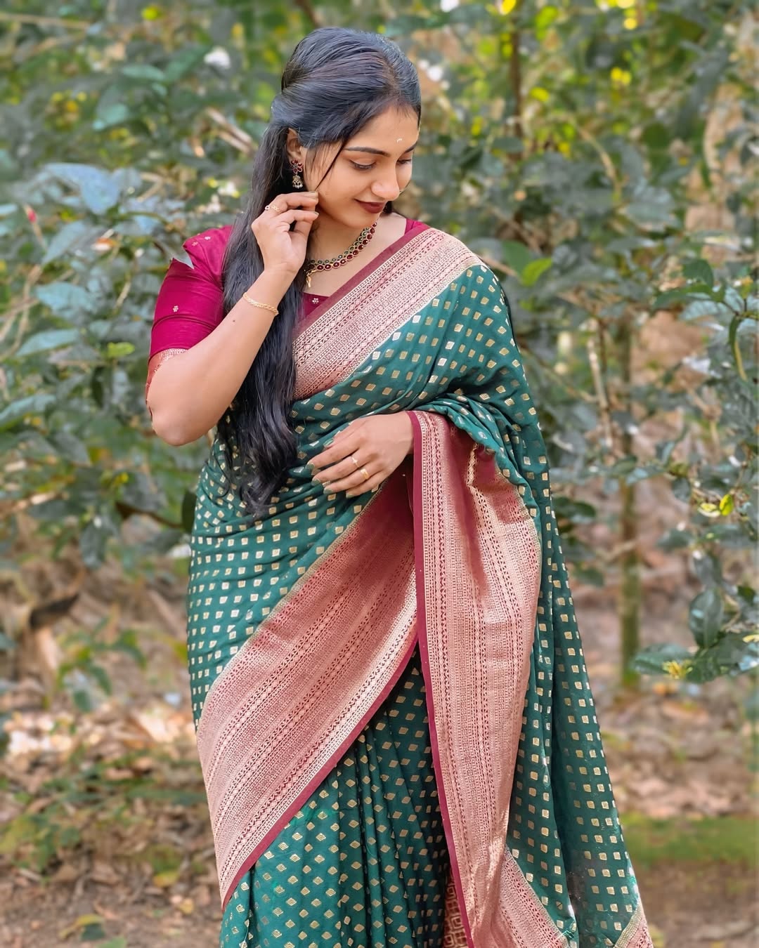 Explore the elegance of the Graceful Charm Banarasi Soft Silk Saree by DCPL. Crafted with gold zari weaving and soft silk fabric, this saree combines simplicity with sophistication — perfect for weddings, festivities, and timeless style.
