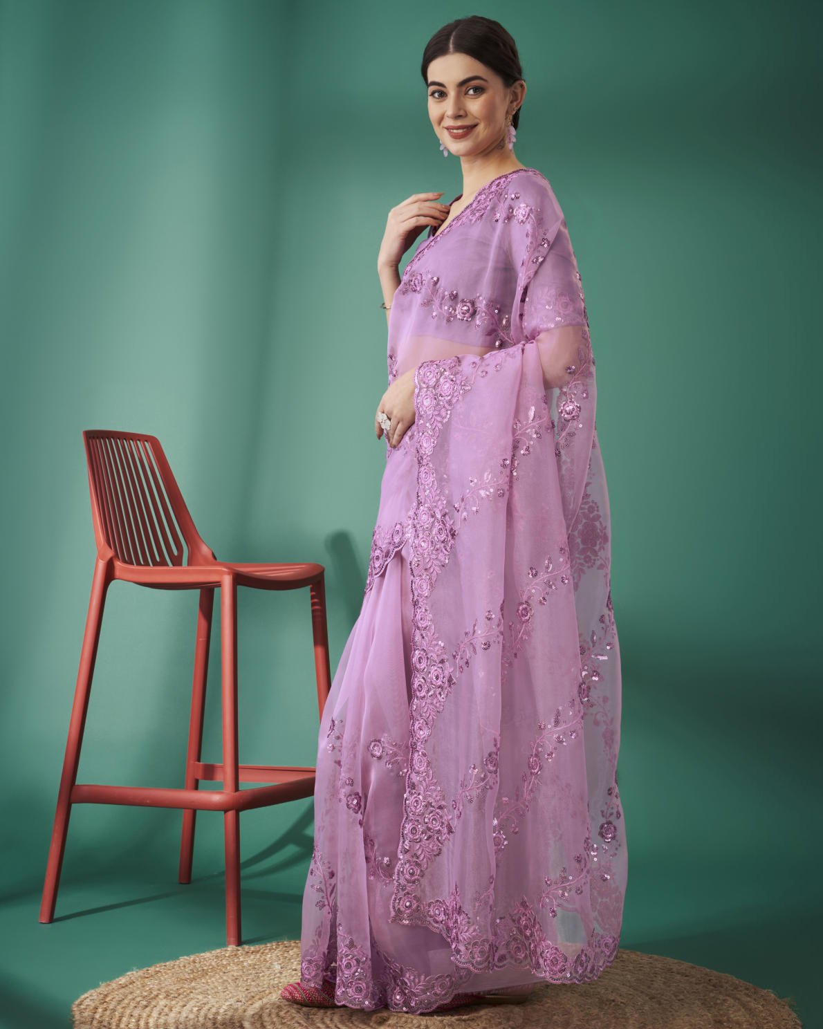 Lilac Organza Silk Saree with 5mm Sequence Embroidery and Cutwork Border worn by model