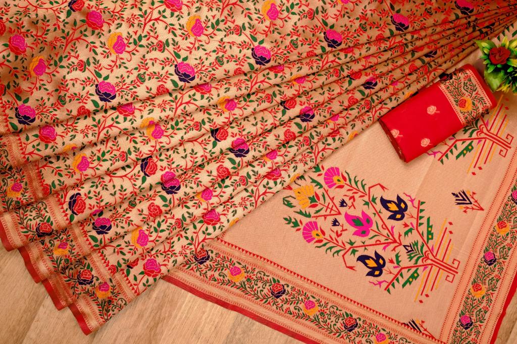 Exquisite Soft Lichi Silk Paithani saree in luminous golden beige, featuring scattered multi-colour floral motifs on the body and a magnificent pallu with vibrant floral tree designs, elegantly draped with a red border.