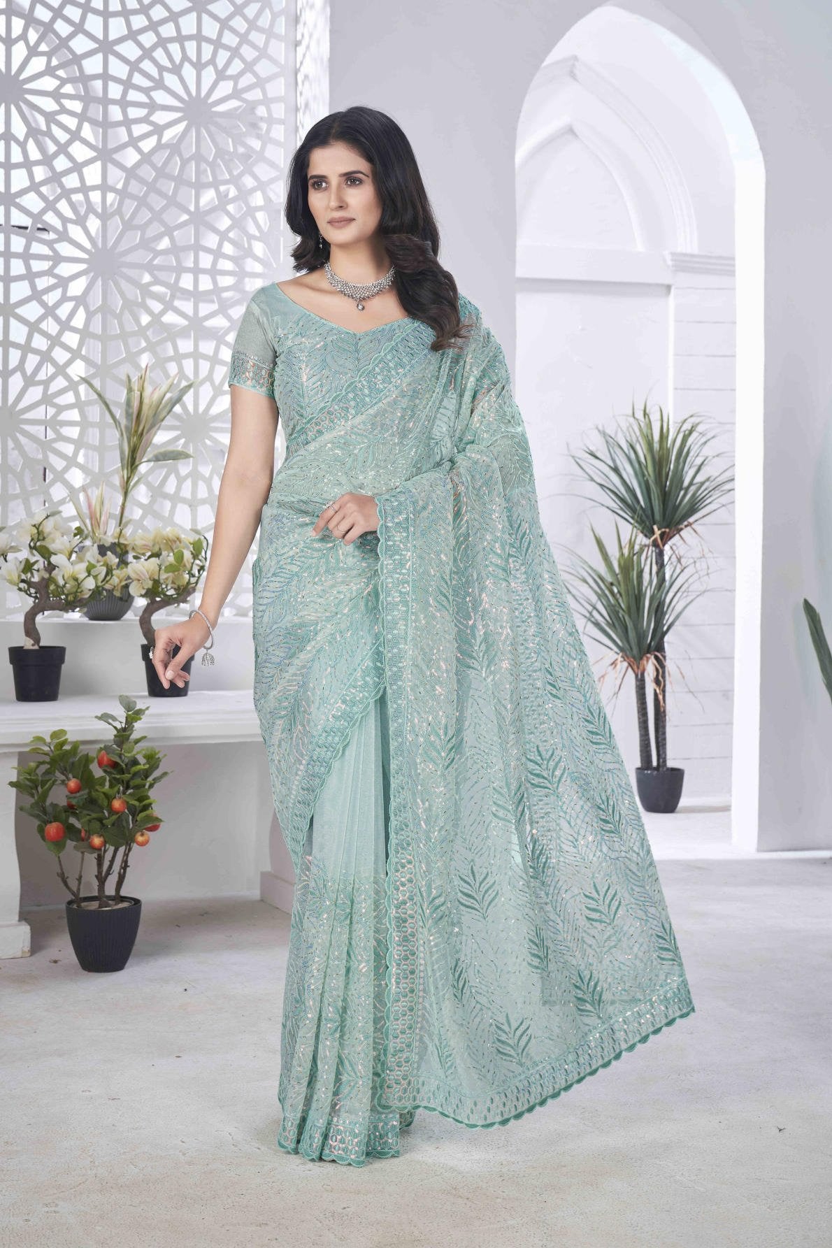 pure tissue net saree with sequins pite work multi colour embroidery and cutwork border