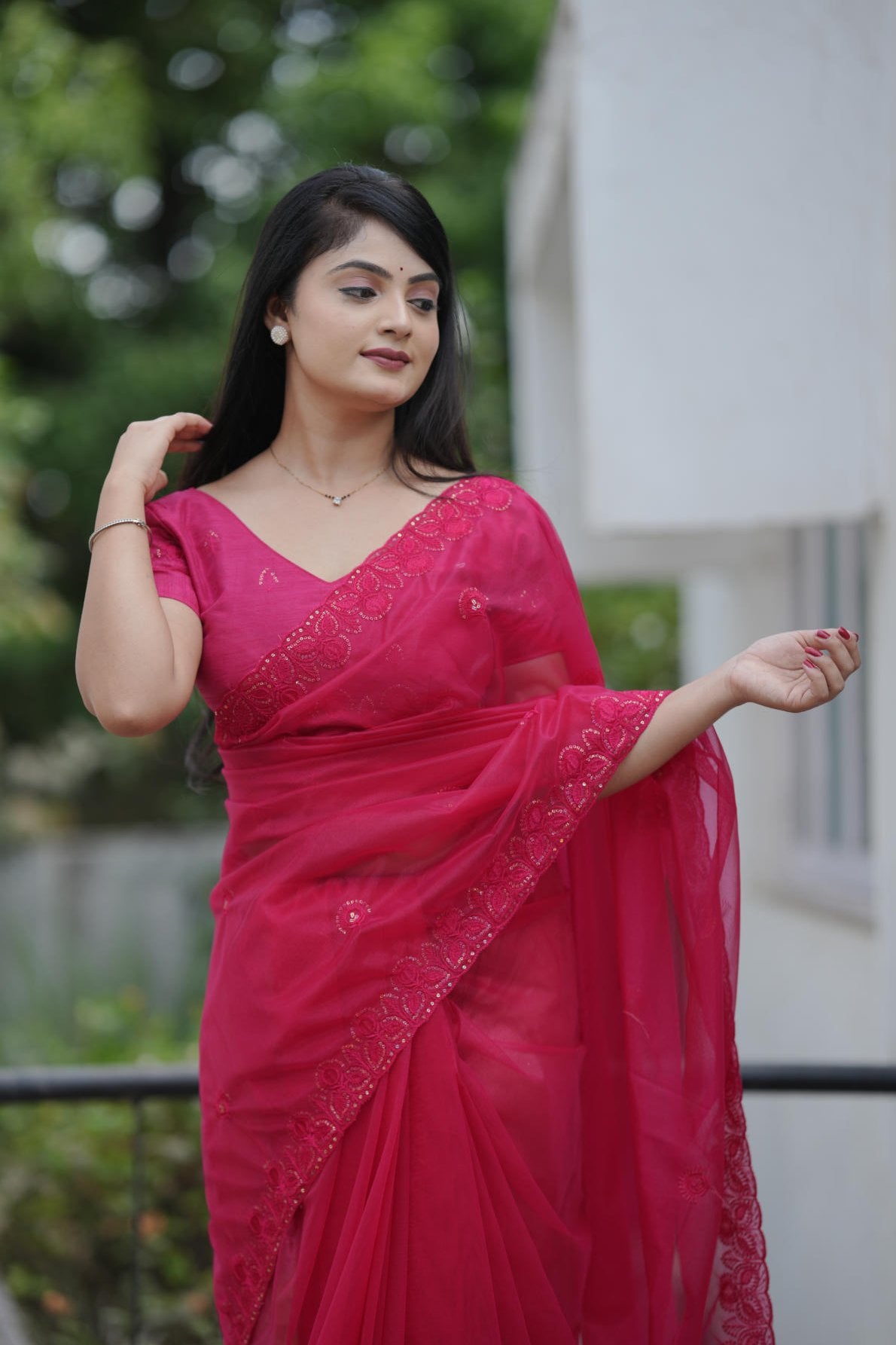 twill net saree with multicolor thread sequins embroidery and cutwork border