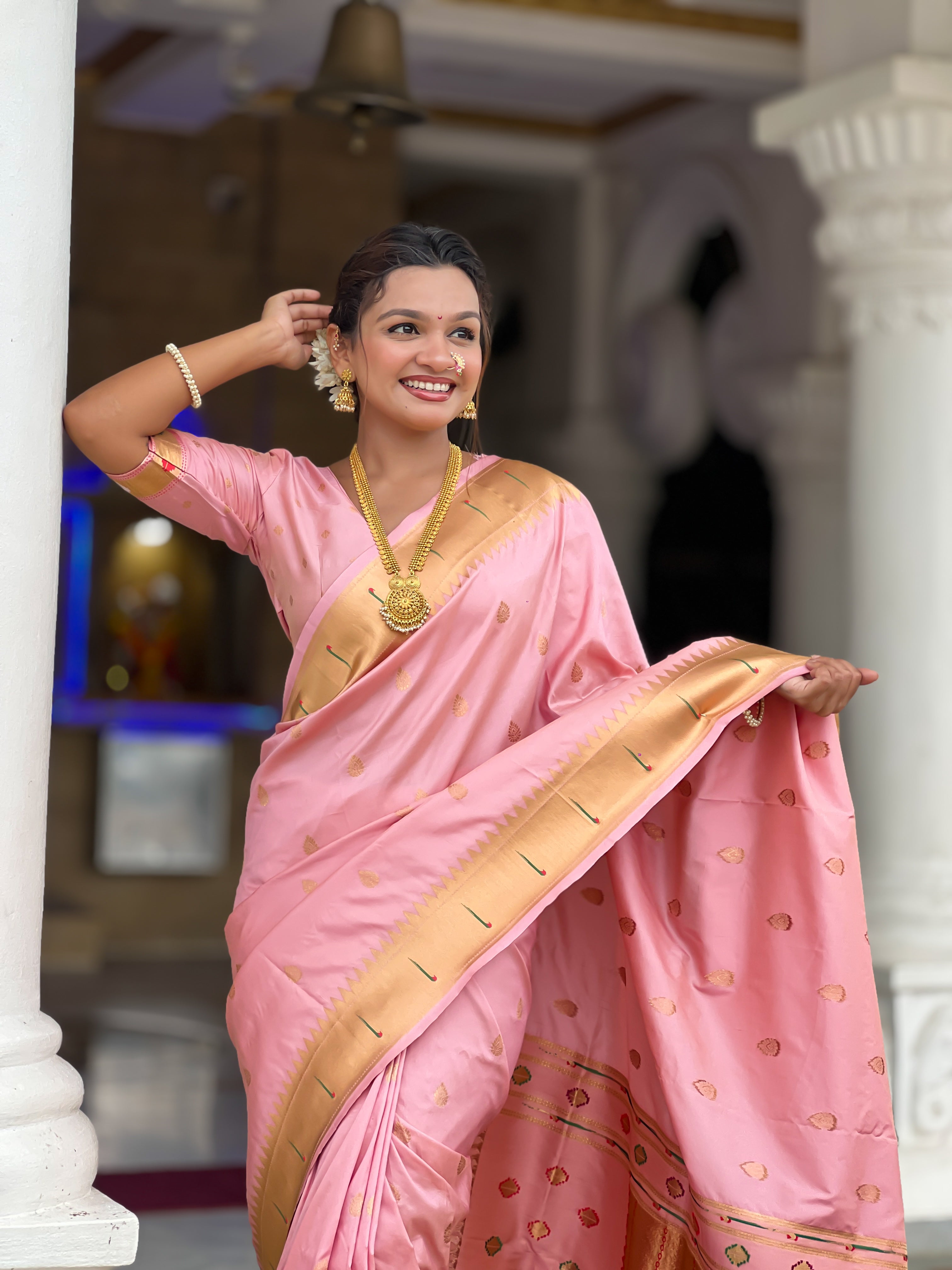 Soft Paithani Silk Saree; Pure Paithani Zari Weaving Motifs; Rich Meenakari Woven Pallu; Traditional Munia Border; Tassels on Pallu; Contrast Woven Silk Blouse with Sleeve Border