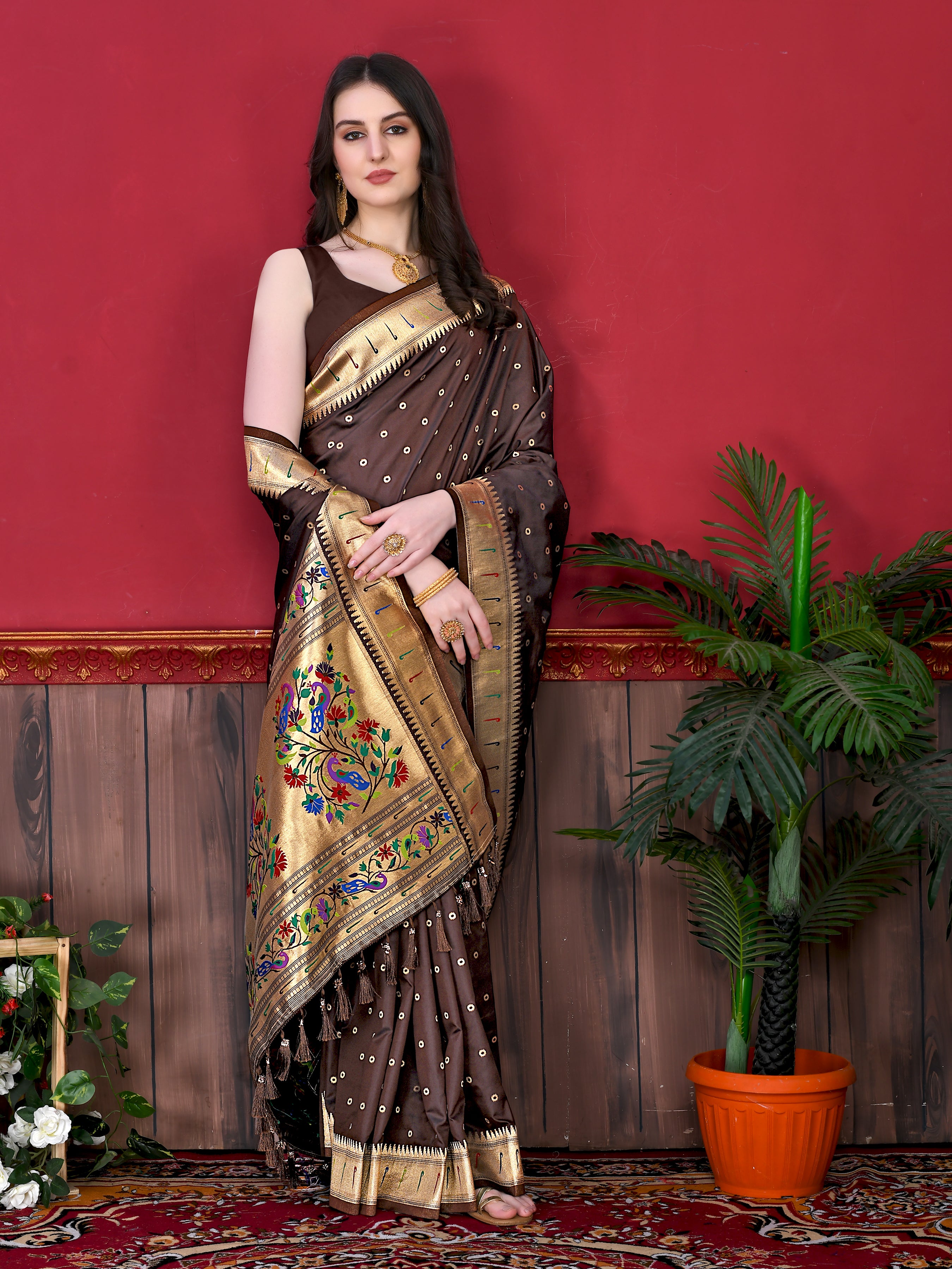 Model wearing Coffee Soft Paithani Silk Saree with gold zari Meenakari border and rich pallu for wedding