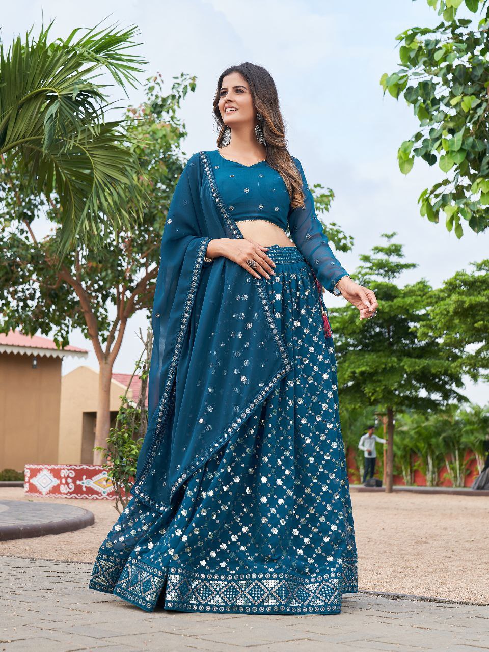 Premium georgette wedding lehenga choli with glitter and twin sequin embroidery by Weave