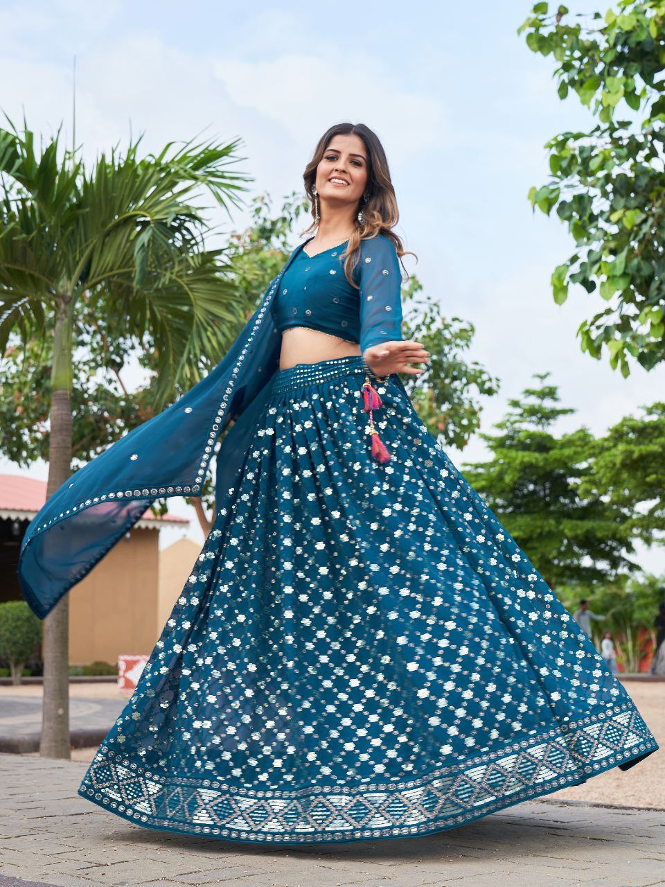 Premium georgette wedding lehenga choli with glitter and twin sequin embroidery by Weave