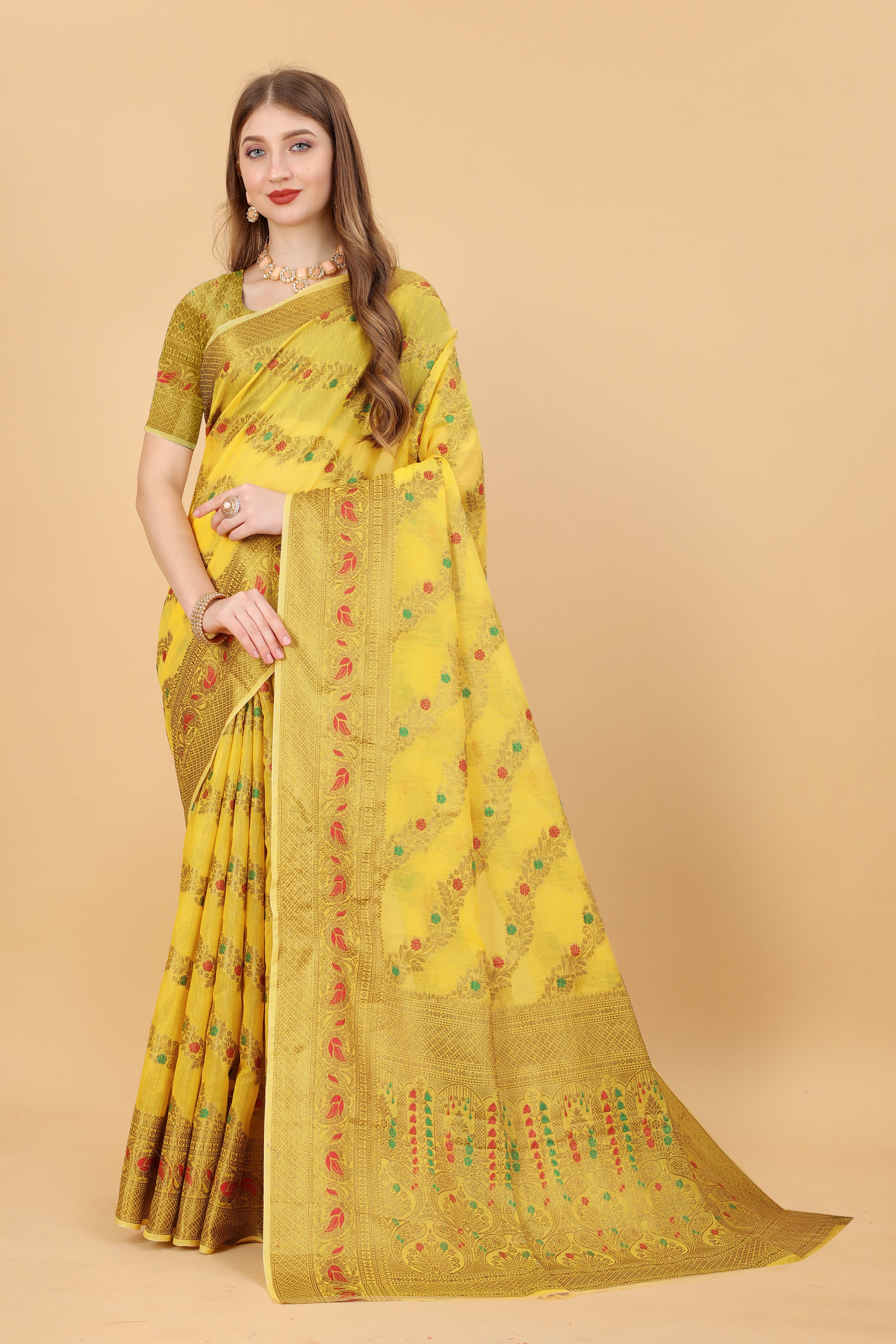 Model wearing Yellow Soft Cotton Saree with intricate gold Zari weaving and rich pallu design