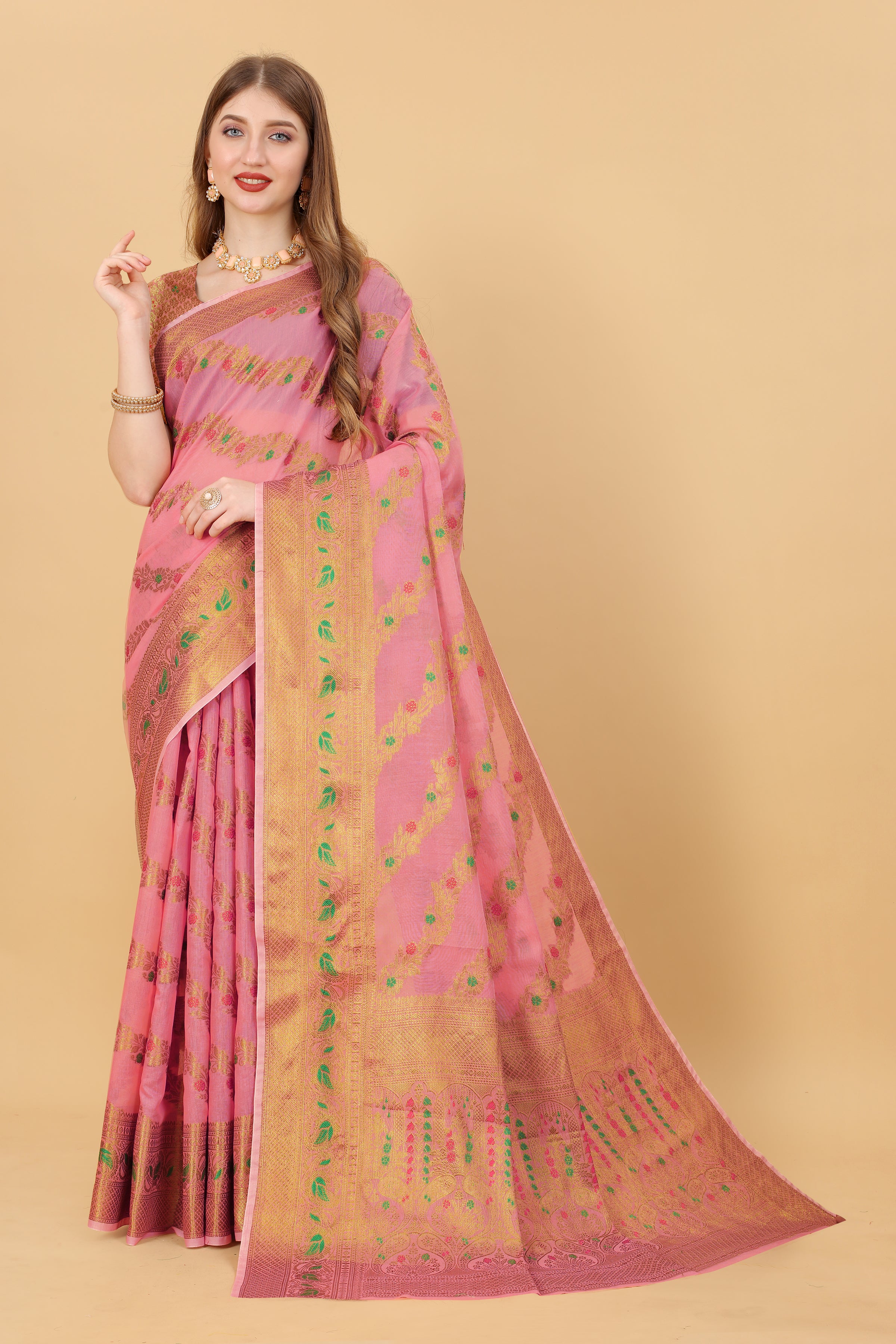 Model wearing Pink Soft Cotton Saree with intricate gold Zari weaving and rich pallu design