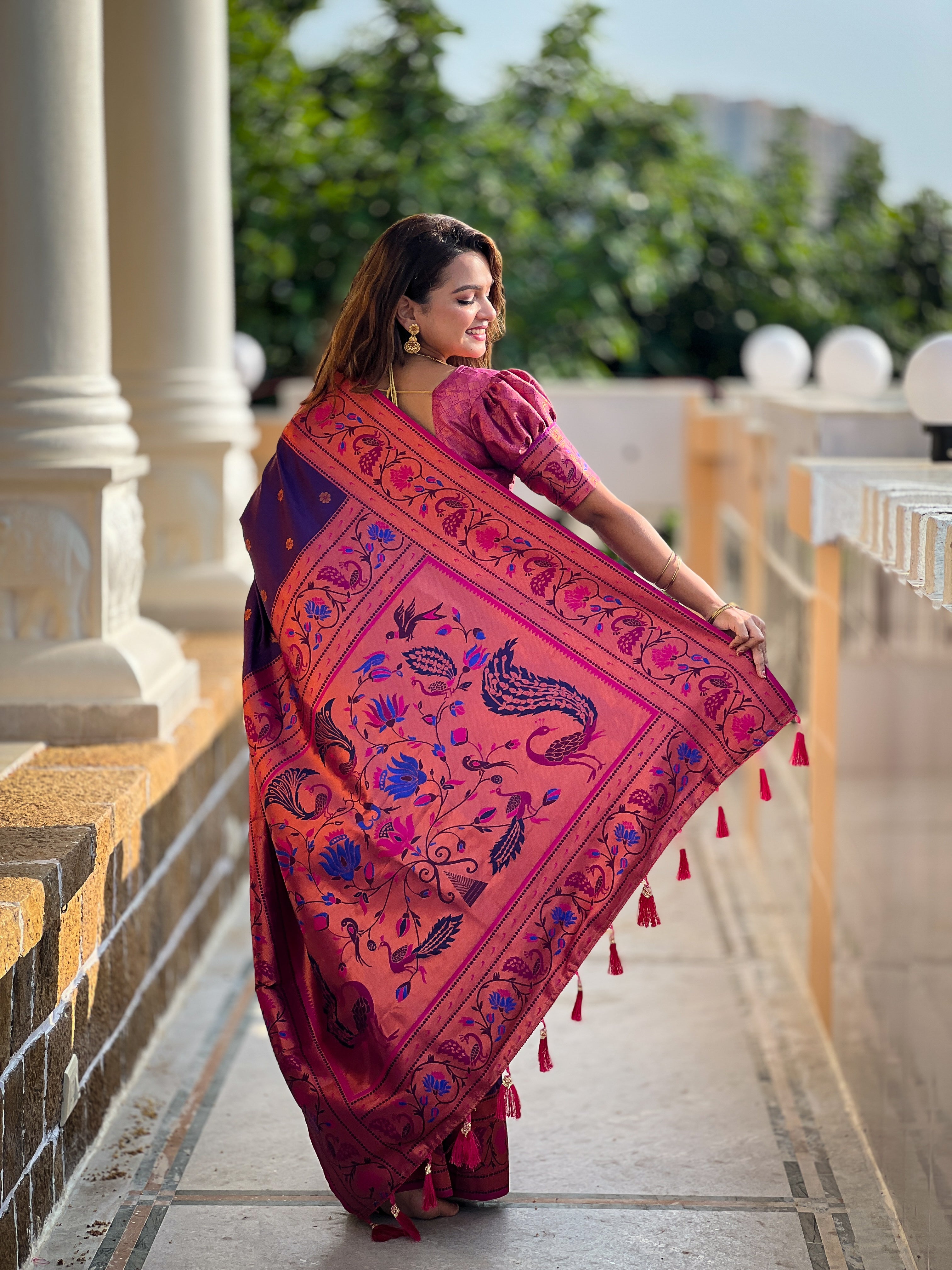 Soft Paithani Silk Saree; Pure Paithani Zari Weaving; Traditional Meenakari Motifs Design Saree; Rich Meenakari Woven Pallu and Border; Tassels on Pallu; Contrast Woven Silk Blouse with Sleeve Border