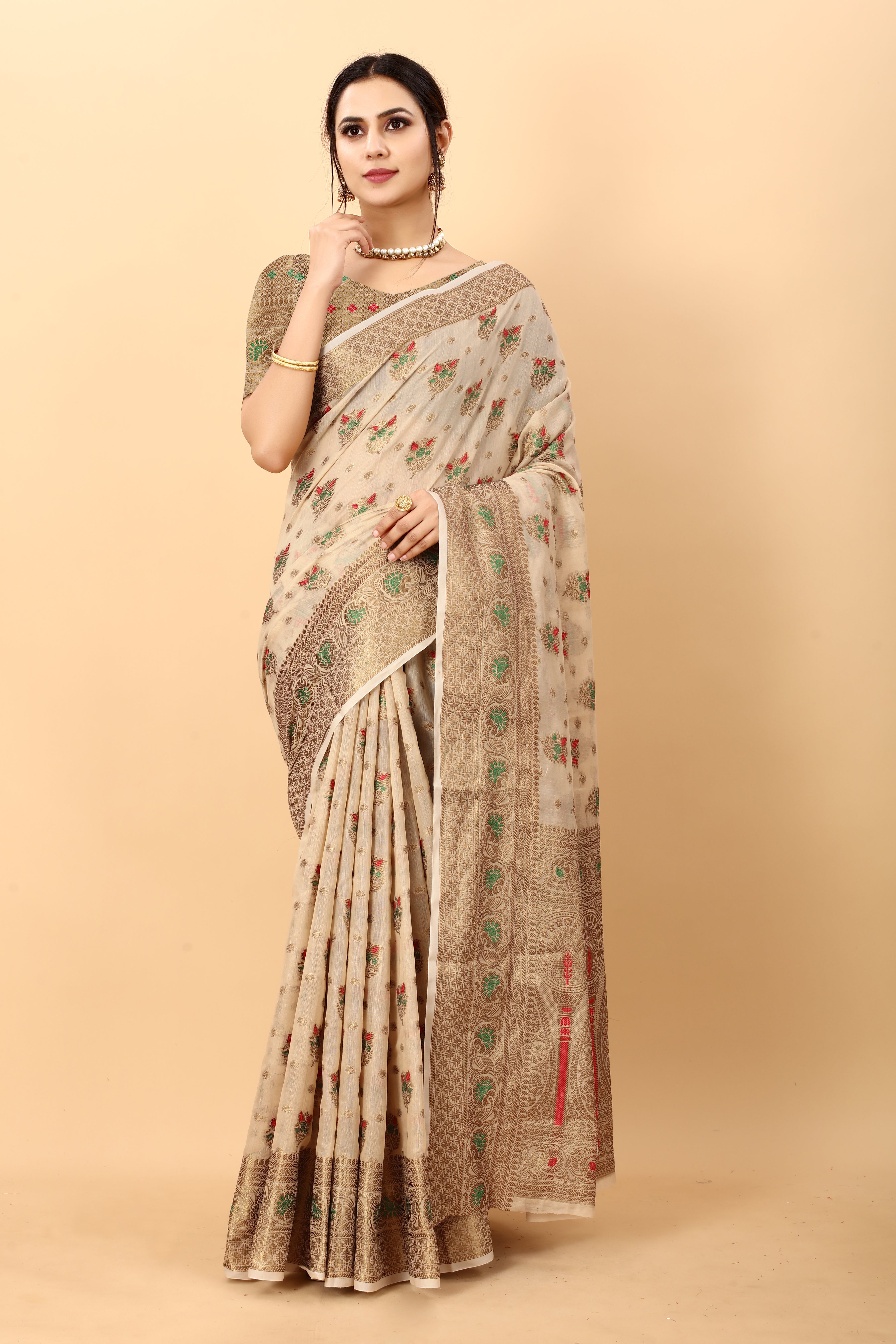 Model wearing Rose Pink soft cotton silk saree with rich golden zari woven pallu and floral motifs