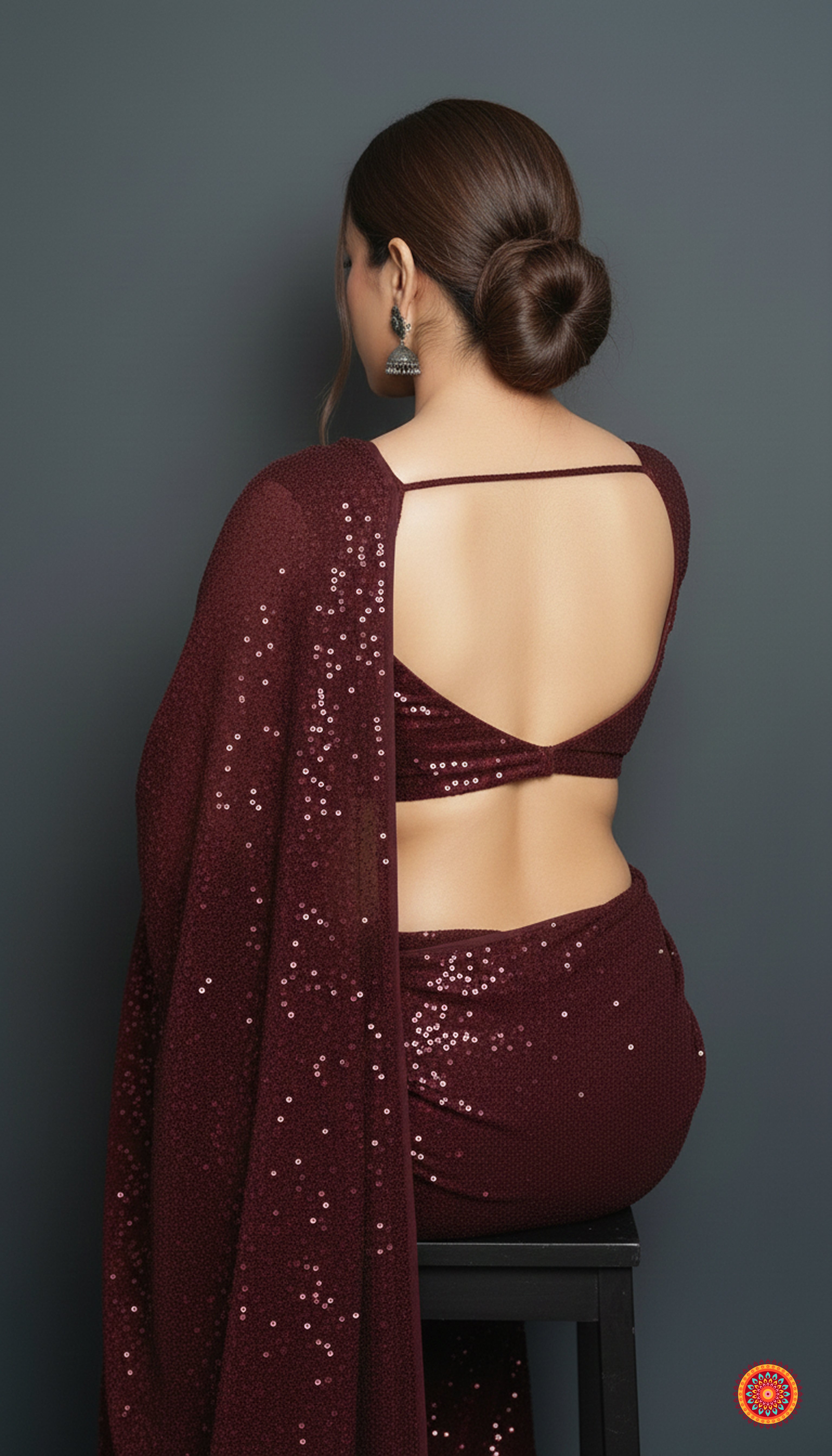 Maroon sparkle georgette saree paired with maroon sparkle velvet blouse for rich festive look