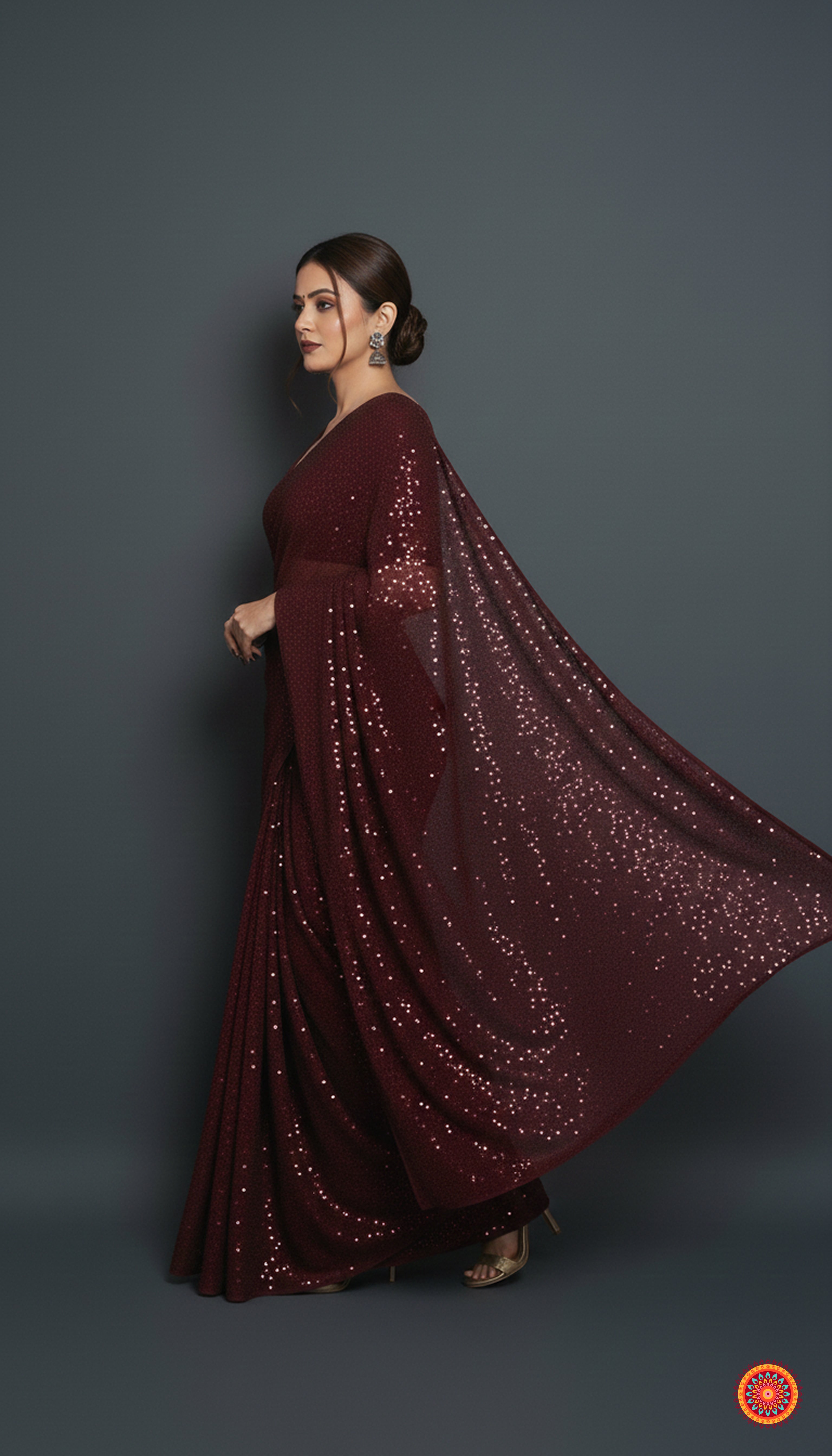 Maroon sparkle georgette saree paired with maroon sparkle velvet blouse for rich festive look