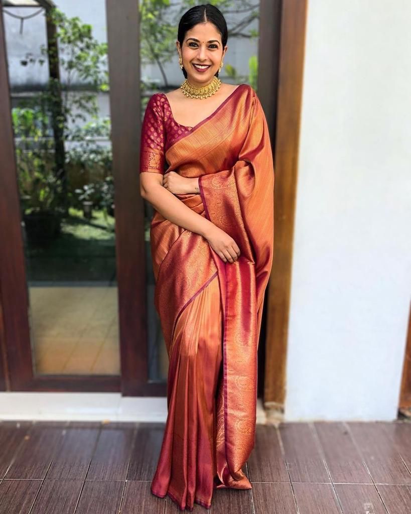 Banarasi Silk saree collection featuring heavy traditional zari weaving and high luster; available in four classic auspicious colors, including red, green, blue, and gold.