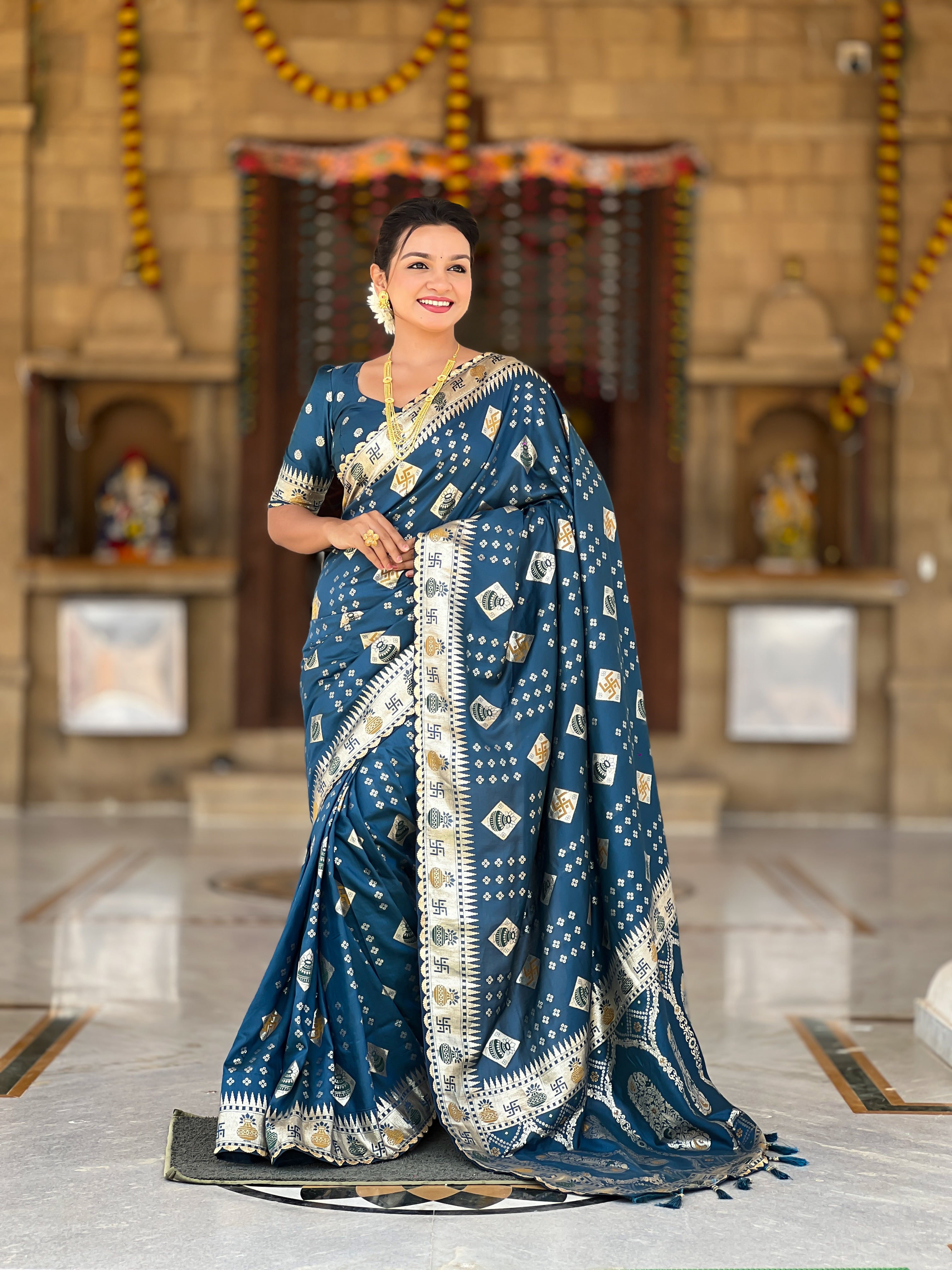 Woman wearing a Morpich soft dola silk saree with gold zari and meenakari weaving, featuring a heavy pallu and tassels, ideal for indian weddings
