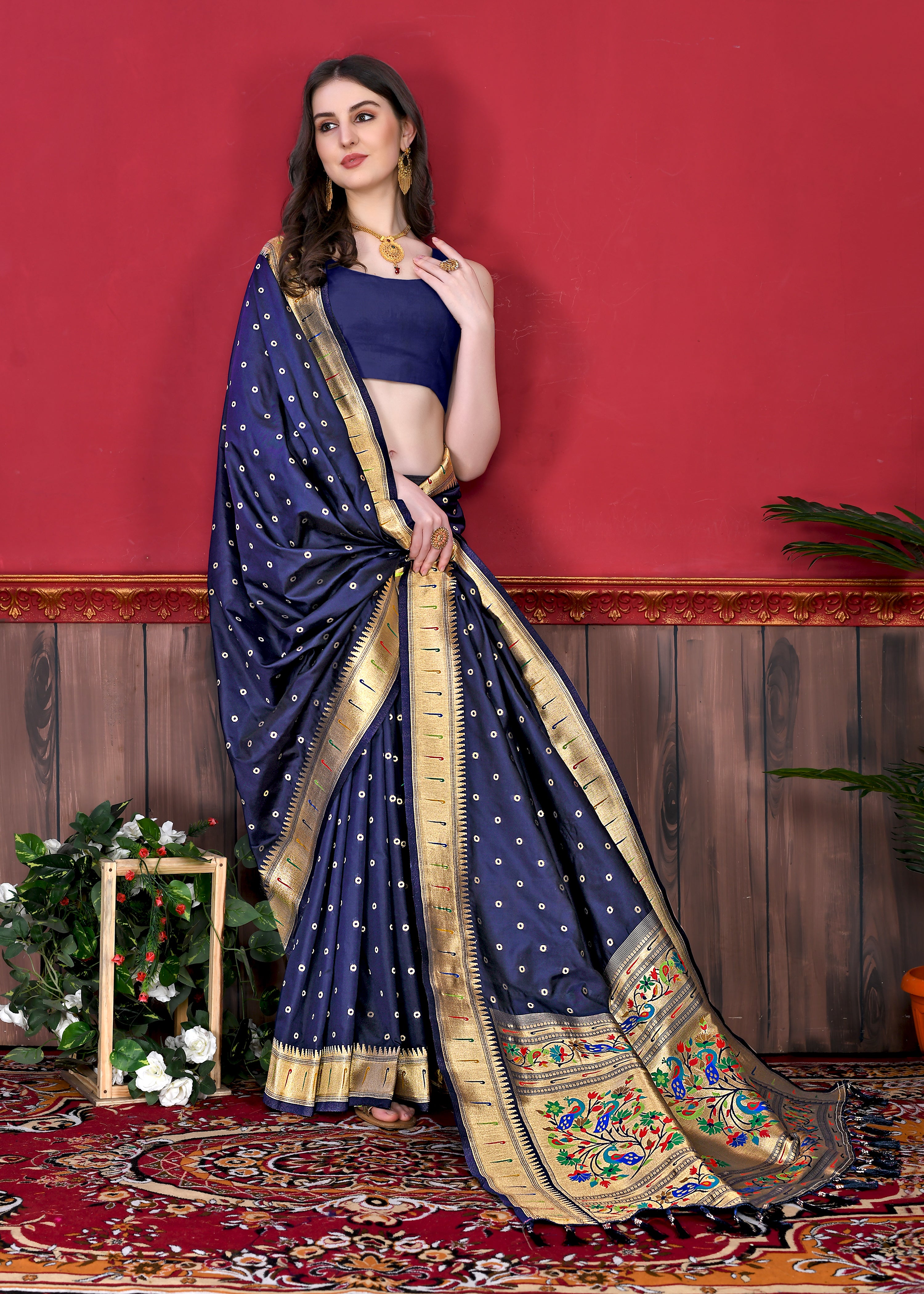 Model wearing N Blue Soft Paithani Silk Saree with gold zari Meenakari border and rich pallu for wedding