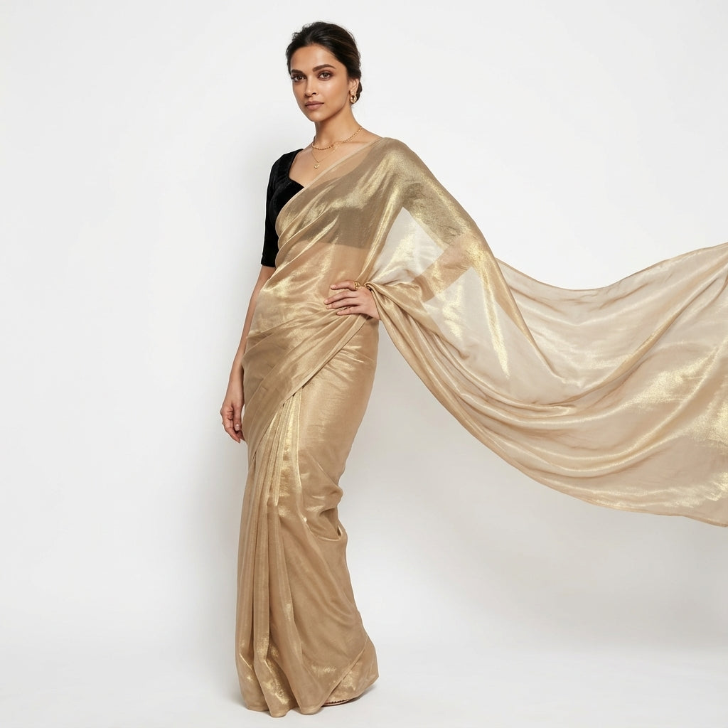 Classic cream fandy saree styled with velvet blouse contrast