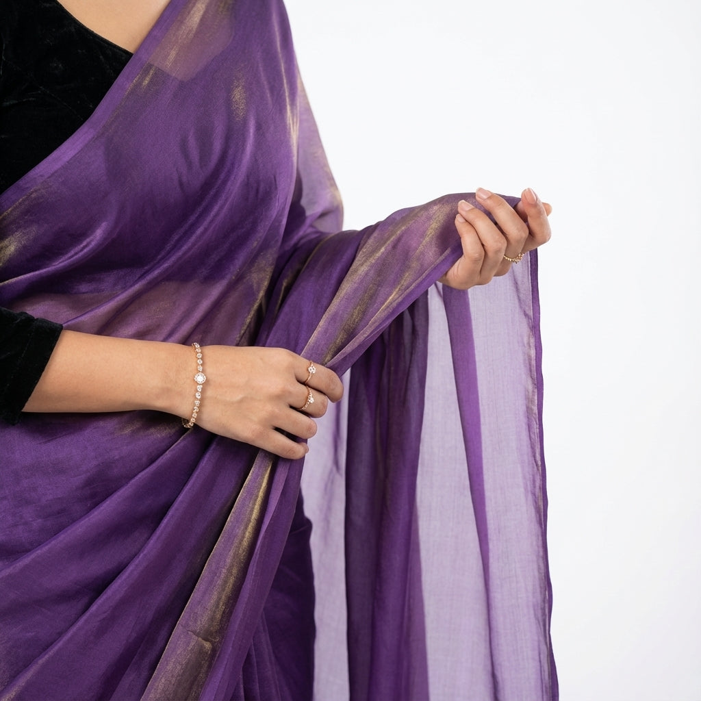 Royal purple fandy saree styled with velvet blouse for elegant ethnic look