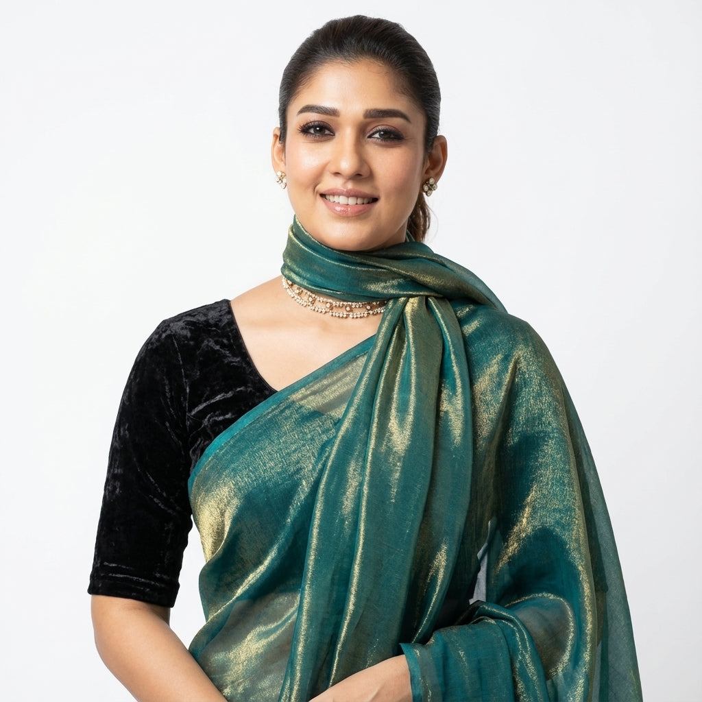 Elegant teal blue fandy saree highlighted with velvet contrast blouse