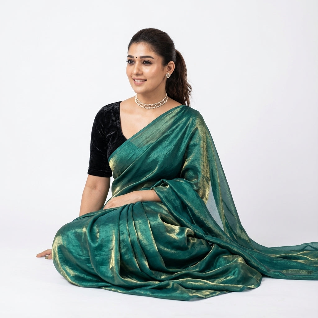 Elegant teal blue fandy saree highlighted with velvet contrast blouse