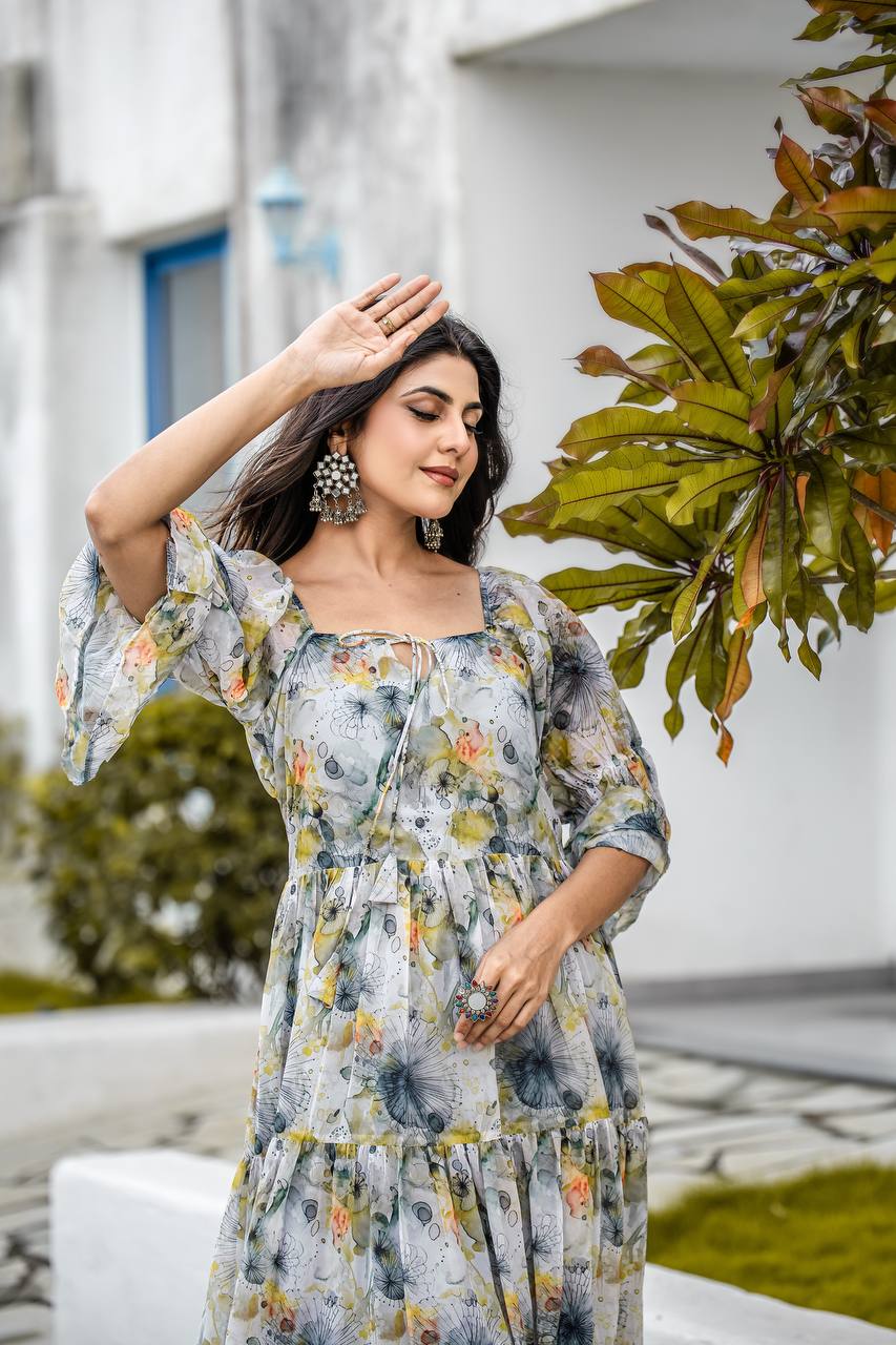 Stylish faux georgette gown with floral and geometric digital print and flared sleeves by Weave