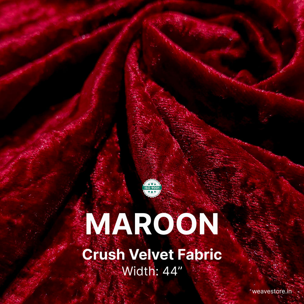 Maroon crush velvet fabric with visible texture and width information.